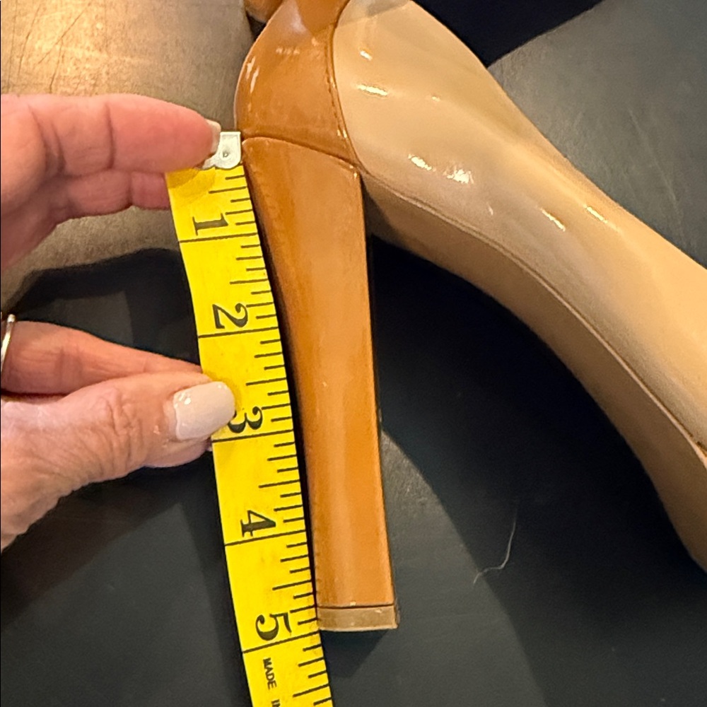 BCBG Paris Nude Patent Leather Platform Pumps
Size 6.5 - Picture 10 of 10